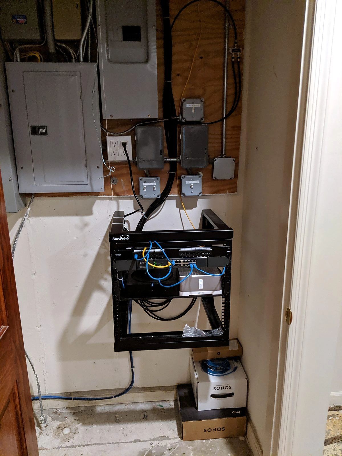 Home wall rack with Sonos and structured wiring