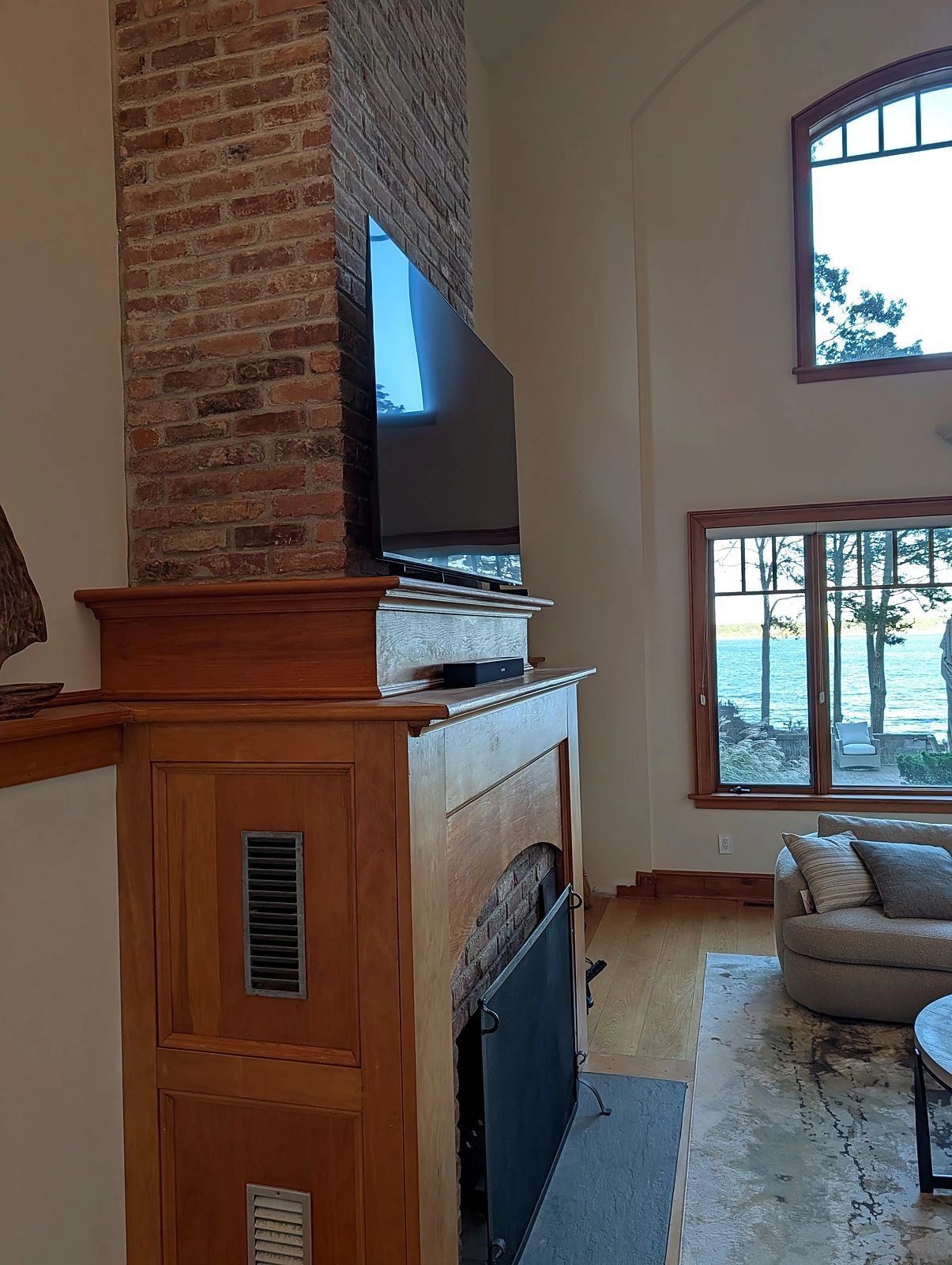 TV over fireplace with soundbar